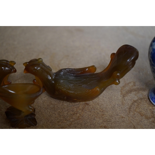 1460 - A pair of unusual Chinese phoenix vessels, possibly agate, vessel with base 11cm high. Condition - o... 