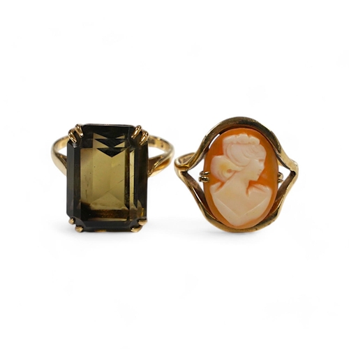 1942 - Two 9ct gold and gem set rings to include citrine and cameo shell, gross weight 8.6 grams. Condition... 