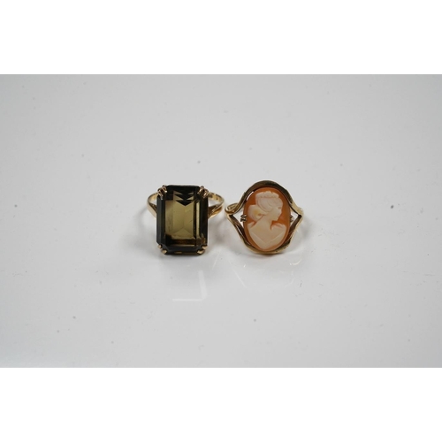 1942 - Two 9ct gold and gem set rings to include citrine and cameo shell, gross weight 8.6 grams. Condition... 