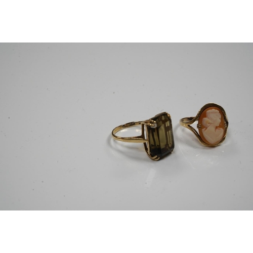 1942 - Two 9ct gold and gem set rings to include citrine and cameo shell, gross weight 8.6 grams. Condition... 