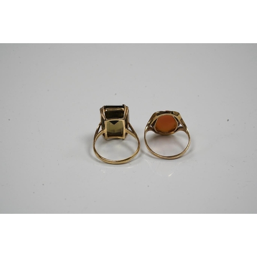 1942 - Two 9ct gold and gem set rings to include citrine and cameo shell, gross weight 8.6 grams. Condition... 