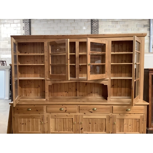 1 - A large modern pine dresser, width 280cm, depth 53cm, height 216cm. Condition - fair