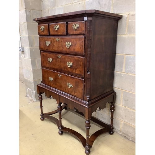 100 - An 18th century walnut chest on later stand, width 106cm, depth 56cm, height 159cm. Condition - fair... 