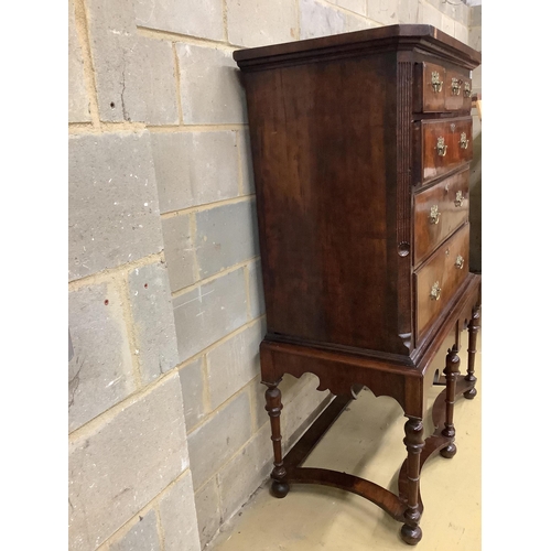 100 - An 18th century walnut chest on later stand, width 106cm, depth 56cm, height 159cm. Condition - fair... 