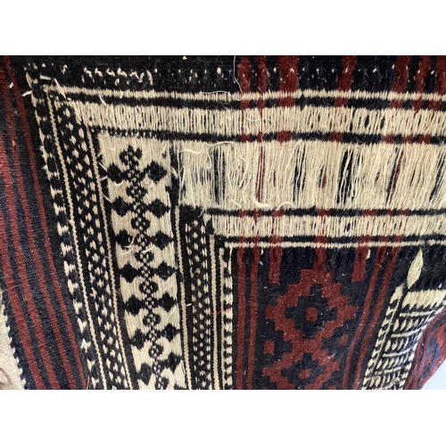 101 - A Kilim flat weave rug, 210 x 142cm. Condition - fair