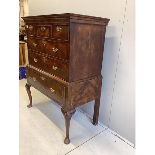 102 - A George II walnut chest on stand, width 104cm, depth 56cm, height 133cm. Condition - fair