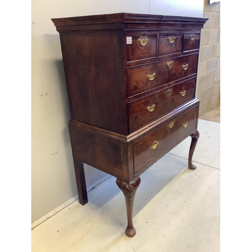 102 - A George II walnut chest on stand, width 104cm, depth 56cm, height 133cm. Condition - fair