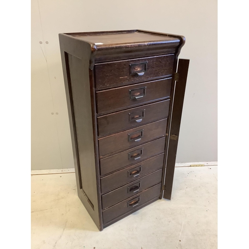 103 - A Globe Wernicke oak eight drawer filing cabinet, width 44cm, depth 34cm, height 97cm. Condition - f... 