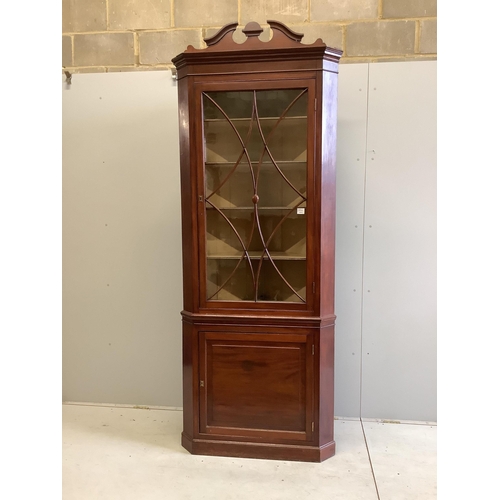 107 - A large 19th century mahogany standing corner cupboard, on plinth base, width 94cm, depth 56cm, heig... 