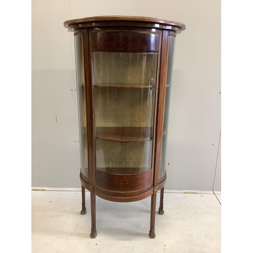 11 - A Louis XVI style bowfront vitrine, width 69cm, depth 40cm, height 133cm. Condition - fair