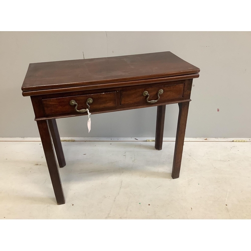 16 - A George III rectangular mahogany folding tea table, width 80cm, depth 36cm, height 72cm. Condition ... 