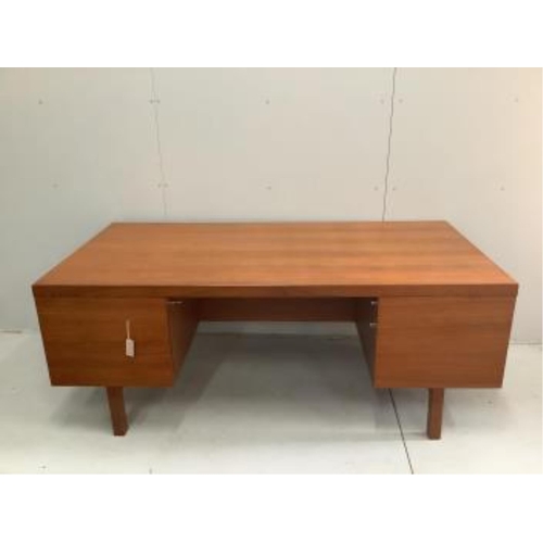 20 - Alfred Cox, a mid century teak kneehole desk, width 183cm, depth 92cm, height 71cm. Condition - good... 