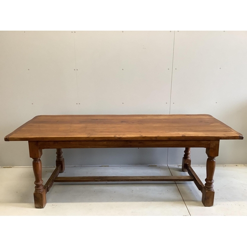 21 - A rectangular oak refectory dining table, width 220cm, depth 84cm, height 74cm. Condition - fair... 