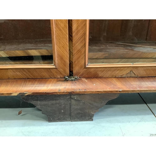 3 - A large 19th century glazed kingwood bookcase, fitted four hinged doors and three adjustable shelves... 