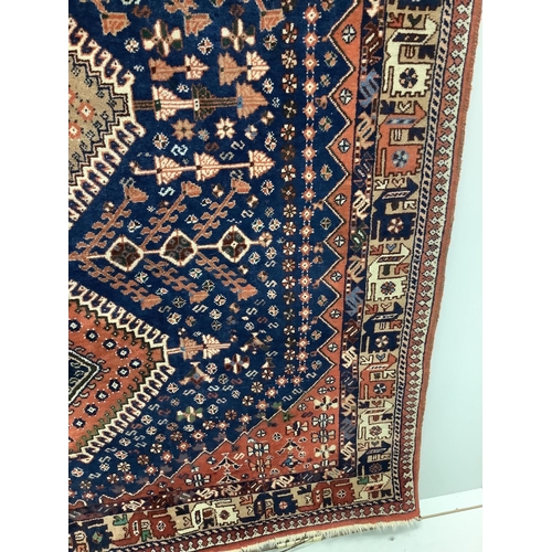 42 - A North West Persian Yalameh blue ground rug, 226 x 151cm. Condition - fair