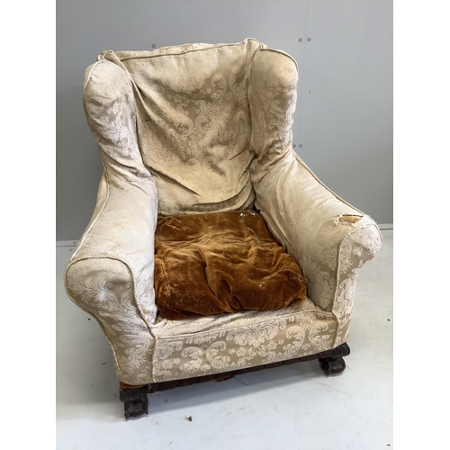 45 - A near pair of early 20th century upholstered armchairs, larger width 81cm, depth 78cm, height 88cm.... 