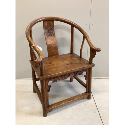 6 - A Chinese carved elm elbow chair, width 71cm, depth 52cm, height 100cm. Condition - fair