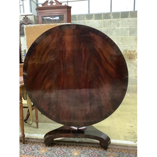 60 - An early Victorian mahogany tilt top breakfast table, diameter 124cm, height 72cm. Condition poor to... 