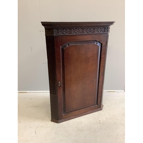 66 - A George III Chippendale style mahogany hanging corner cabinet, width 75cm, depth 41cm, height 102cm... 