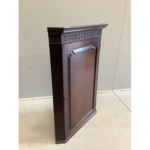 66 - A George III Chippendale style mahogany hanging corner cabinet, width 75cm, depth 41cm, height 102cm... 