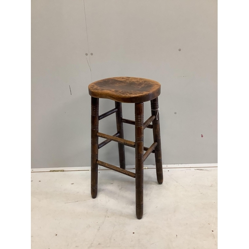 67 - A vintage beech bar stool, height 76cm. Condition - fair to good