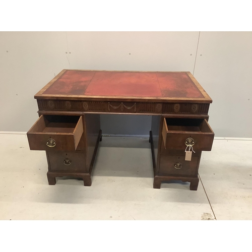 68 - An early Georgian style walnut pedestal desk with inset leather top, width 117cm, depth 71cm, height... 