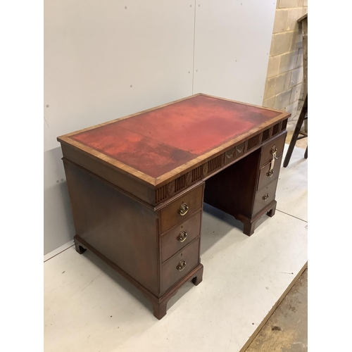 68 - An early Georgian style walnut pedestal desk with inset leather top, width 117cm, depth 71cm, height... 