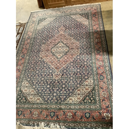 71 - An Iranian blue ground carpet, 300 x 200cm. Condition - fair