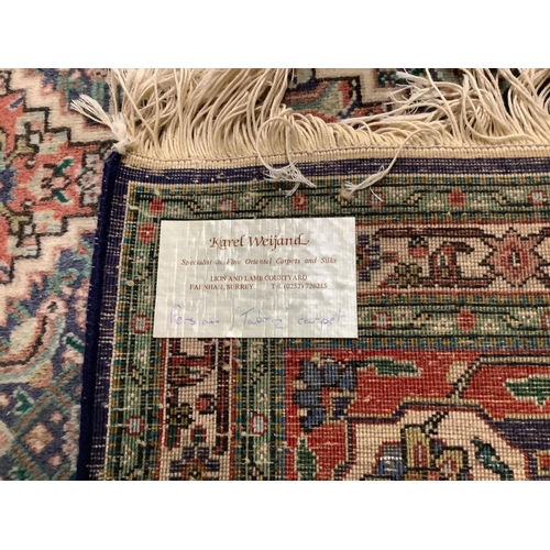 71 - An Iranian blue ground carpet, 300 x 200cm. Condition - fair