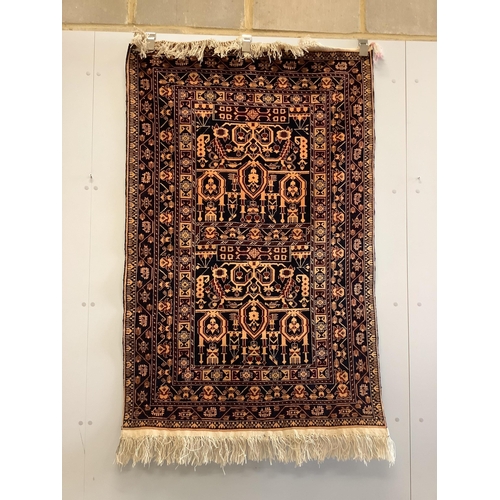 78 - A North West Persian blue ground rug, 148 x 96cm. Condition - good