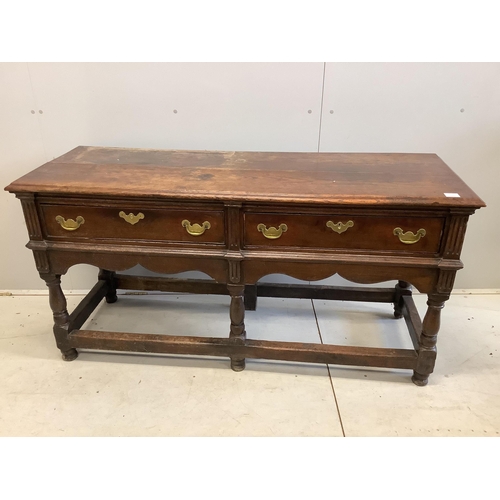 98 - An 18th century oak low dresser base with two long drawers, width 150cm, depth 53cm, height 77cm. Co... 