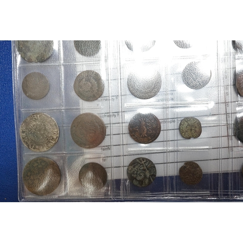 988 - A large collection of Roman AE and AR coins, in an album