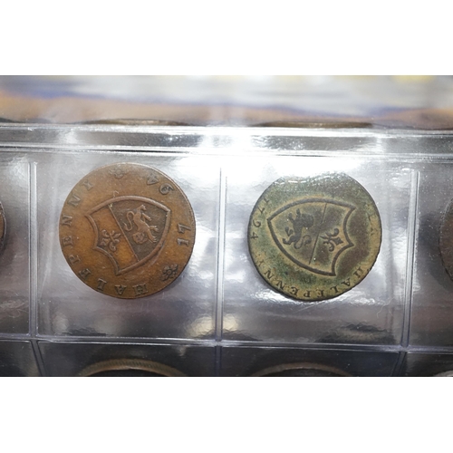 989 - A large collection of halfpenny tokens and gaming tokens, 17th to early 20th century, in an album al... 