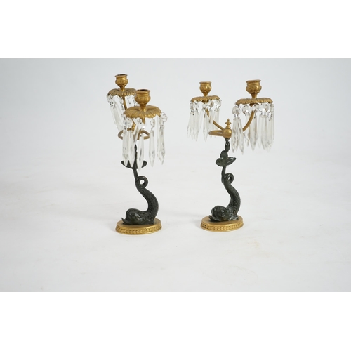 25 - A pair of 19th century bronze and ormolu twin sconce candelabra with cut glass icicle drops, reeded ... 