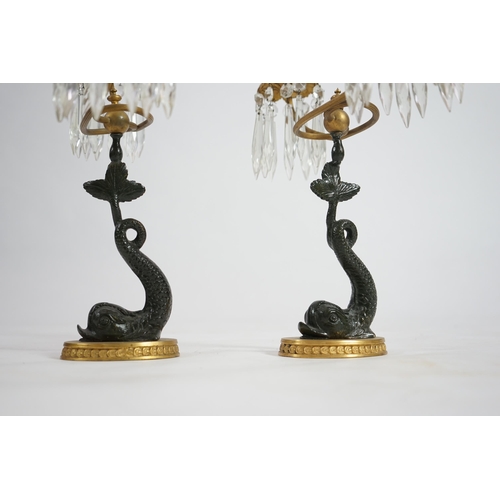 25 - A pair of 19th century bronze and ormolu twin sconce candelabra with cut glass icicle drops, reeded ... 