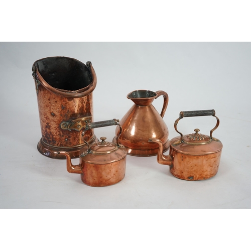 34 - A Victorian Loftus of Oxford Street copper one gallon flagon, 24cm, two copper kettles and a coal he... 