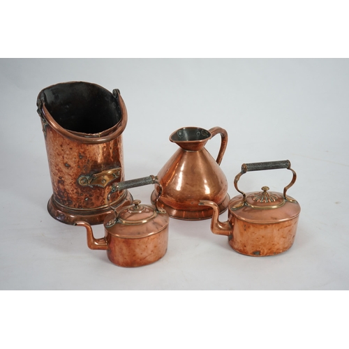 34 - A Victorian Loftus of Oxford Street copper one gallon flagon, 24cm, two copper kettles and a coal he... 