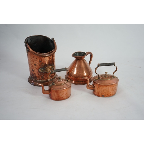 34 - A Victorian Loftus of Oxford Street copper one gallon flagon, 24cm, two copper kettles and a coal he... 