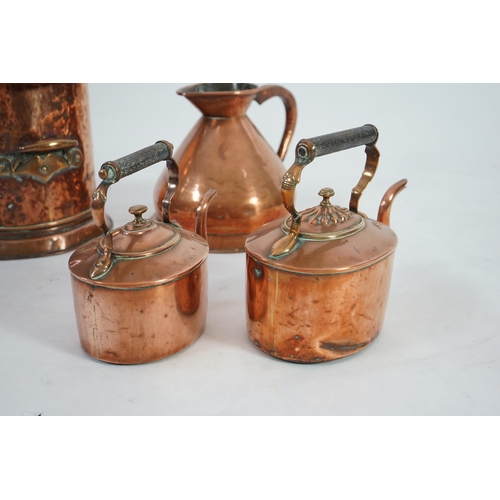 34 - A Victorian Loftus of Oxford Street copper one gallon flagon, 24cm, two copper kettles and a coal he... 