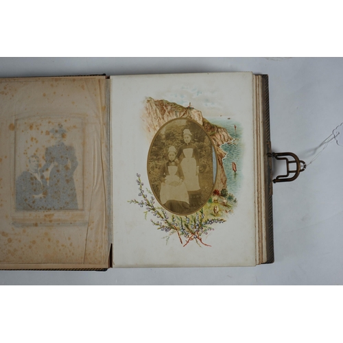 39 - A late 19th century musical embossed leather photograph album 'The Seaside Album' by J.C.M Co. Ltd w... 