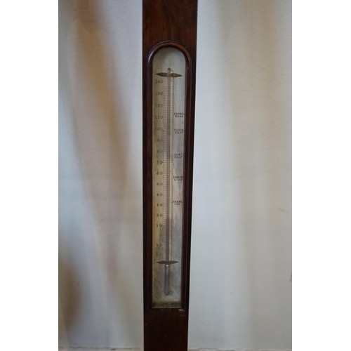 44 - A George III mahogany stick barometer signed Garoe & Co. Edinburgh, 93cm and a Regency wheel baromet... 