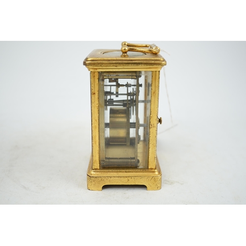 45 - A French gilt brass carriage timepiece, 8cm wide, 12cm high