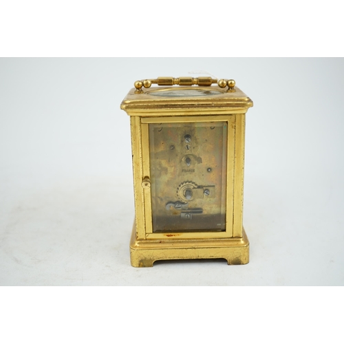 45 - A French gilt brass carriage timepiece, 8cm wide, 12cm high