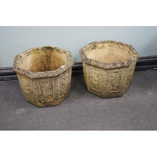 58 - A pair of Willowstone octagonal reconstituted stone garden planters, 40cm wide, 30cm high