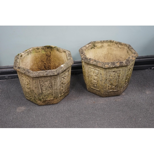 58 - A pair of Willowstone octagonal reconstituted stone garden planters, 40cm wide, 30cm high