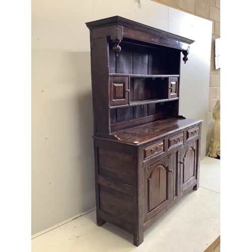 1012 - An early 18th century style oak dresser, width 142cm, depth 52cm, height 188cm. Condition - fair... 