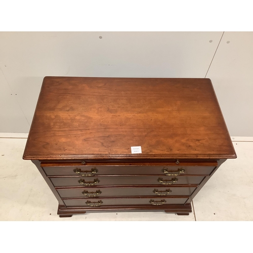 1014 - A George III style mahogany chest, fitted four long drawers, beneath a brushing slide, width 84cm, d... 