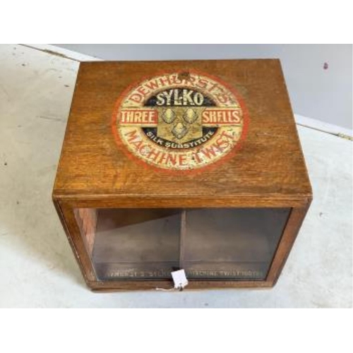 1021 - An early 20th century oak counter top display case, 'Dewhursts Sylko three shells machine twist' on ... 