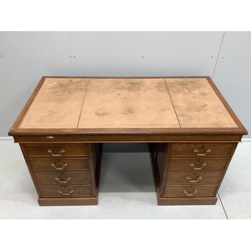 1023 - An early 20th century oak pedestal desk, bears George V cypher and stamped John Walsh Ltd Sheffield,... 