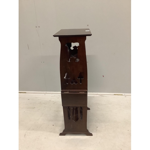 1026 - A late 19th century Arts & Crafts mahogany open bookcase, with embossed copper mounted shelf fronts,... 